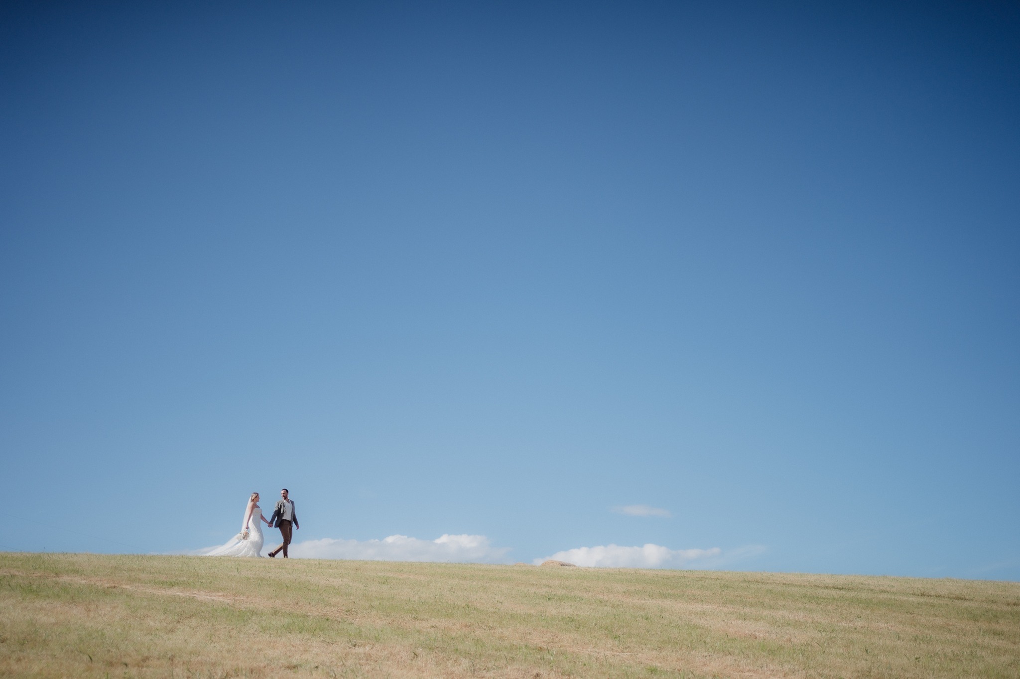 Dunedin Wedding Grandview Gardens blue sky Bride Groom